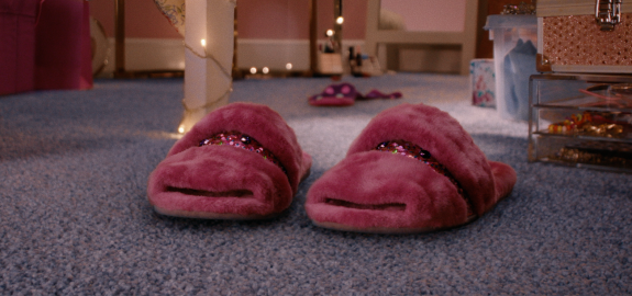 Gemini & Virgo, a pair of pink slippers on a blue saxony carpet